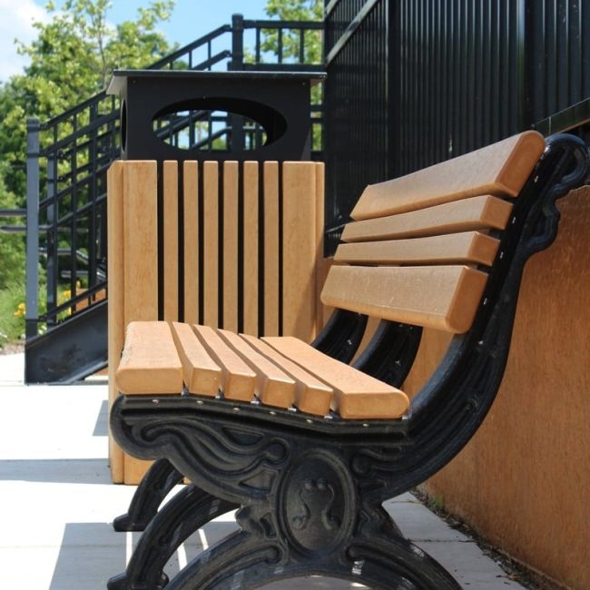Cambridge bench frame showing its unique green-scapes feature and detail of like wrought iron appreance.